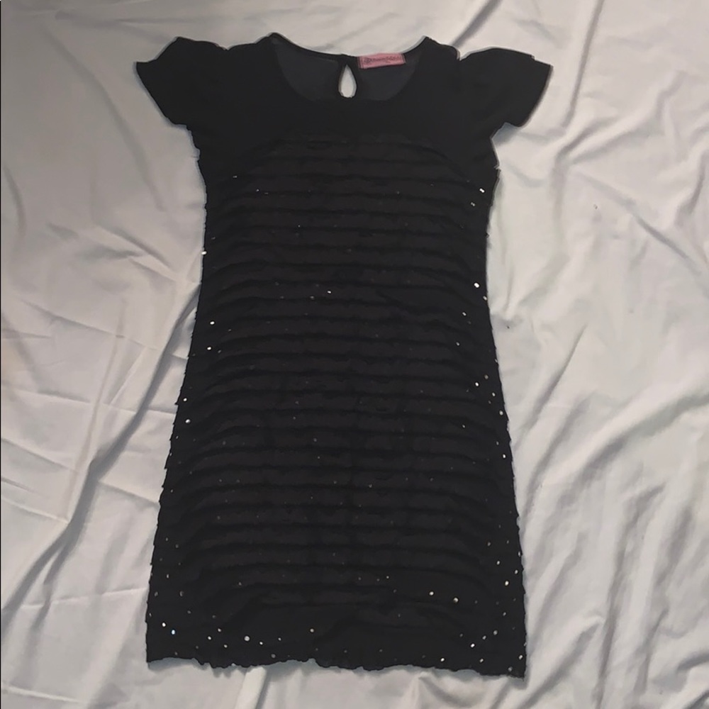 A black Ruffle dress